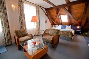 Posezení v ubytování Altstadthotel Bad Griesbach + 30 fotografií
