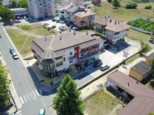 an overhead view of a large house in a city at Guest House Chinar 08 in Kirkovo