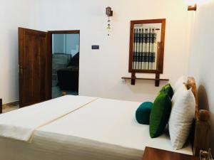 Letto o letti in una camera di Perfect Hideout