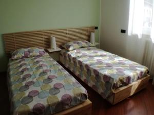 Letto o letti in una camera di B&B SARI