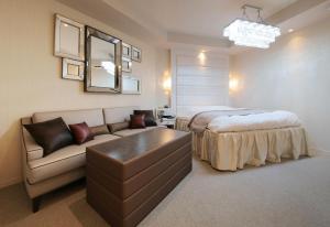 A bed or beds in a room at N Hotel