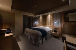 A bed or beds in a room at N Hotel
