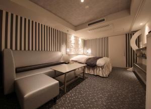 A bed or beds in a room at N Hotel