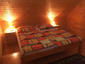 Postel nebo postele na pokoji v ubytování Chalupa Pohoda Slovenský raj Hrabušice