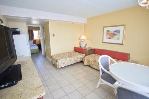 TV a/nebo společenská místnost v ubytování Quebec Motel