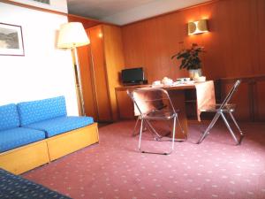 Zona de estar de R.T.A. Hotel des Alpes 2