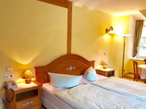 Postel nebo postele na pokoji v ubytování Hotel Residenz Rennhack