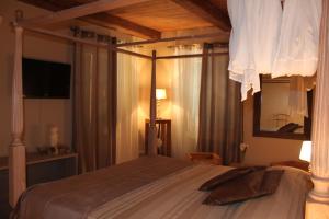 Letto o letti in una camera di Hotel Al Convento