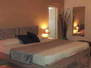 Letto o letti in una camera di Hotel Al Convento
