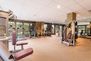 a gym with treadmills and ellipticals in a building at First Tracks 3303 Condo in Steamboat Springs