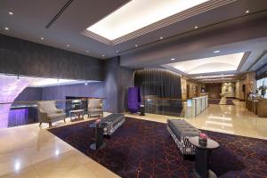 Rendezvous Hotel Singapore by Far East Hospitality tesisinde bir oturma alanı