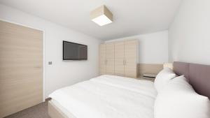 Letto o letti in una camera di all inclusive Hotel Lohmann