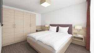Letto o letti in una camera di all inclusive Hotel Lohmann