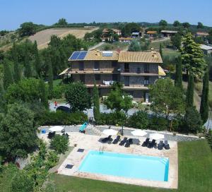 an aerial view of a resort with a swimming pool at Fattoria Capobianco in Montefiascone