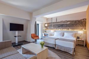 Ένα ή περισσότερα κρεβάτια σε δωμάτιο στο EXE Liberdade