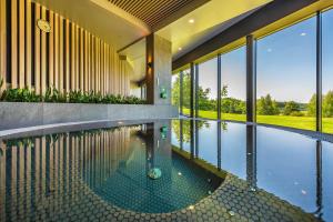 Bazén v ubytování Vilnius Grand Resort nebo v jeho okolí