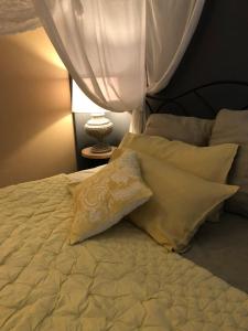 Postel nebo postele na pokoji v ubytování La dimora del Casanova B&B boutique