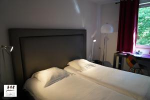 Легло или легла в стая в Enzo Hôtels Premier Prix - Logis Amnéville