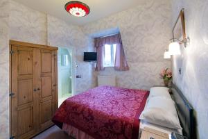 Cama o camas de una habitación en Shemara Guest House