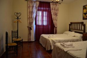 A bed or beds in a room at Amanecer en Campos