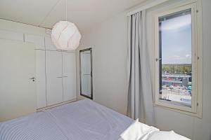 Postel nebo postele na pokoji v ubytování Pro Apartments 2