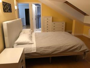 Postel nebo postele na pokoji v ubytování Lugo 360