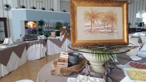 Posedenie v ubytovaní Hotel Le Ginestre Family & Wellness