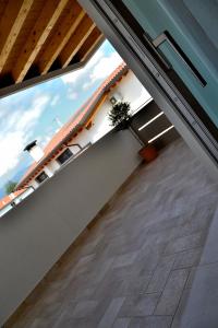 - une vue depuis le balcon d'une maison dans l'établissement Residenze Cà Fabris, à Romano D'Ezzelino