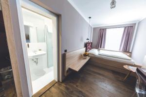 Posteľ alebo postele v izbe v ubytovaní Altstadthotel Kasererbräu + 37 fotografií