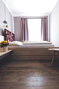 Posteľ alebo postele v izbe v ubytovaní Altstadthotel Kasererbräu