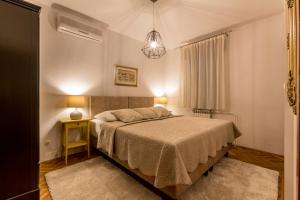 Postel nebo postele na pokoji v ubytování Split-Villas Dalmatica for 12