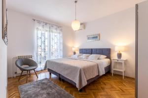 Postel nebo postele na pokoji v ubytování Split-Villas Dalmatica for 12 + 37 fotografií