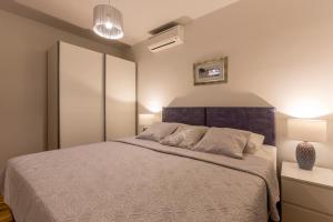 Postel nebo postele na pokoji v ubytování Split-Villas Dalmatica for 12
