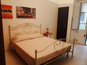 a bedroom with a bed in a room at centralcity in Reggio di Calabria