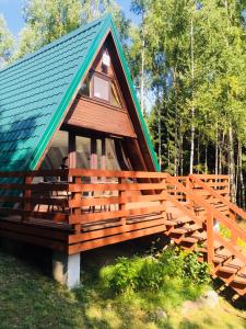 Vonkajšia záhrada v ubytovaní Domek Przy Lesie