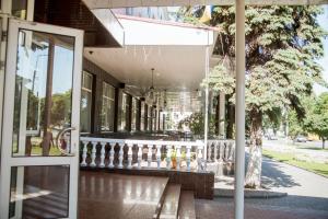 an open door to a building with a porch at Dniprovski Zori in Kremenchuk