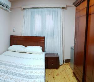 Postel nebo postele na pokoji v ubytování Caesar House