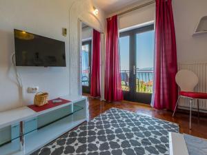 Et tv og/eller underholdning på Apartments Susanne