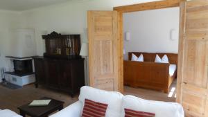 Postel nebo postele na pokoji v ubytování Ferienhaus Gut Rattelvitz Insel Rügen