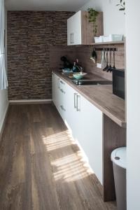 Dapur atau dapur kecil di Moserhof-Apartments