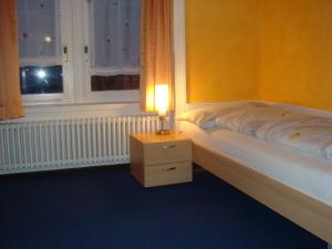 Llit o llits en una habitació de Hotel Gotthard
