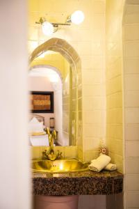 Kylpyhuone majoituspaikassa Riad Villa Harmonie