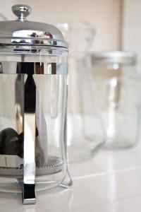 a close up of a glass appliance on a counter at Sesfontein Guesthouse in Sesfontein