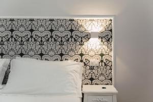 Posteľ alebo postele v izbe v ubytovaní Elysium B&B