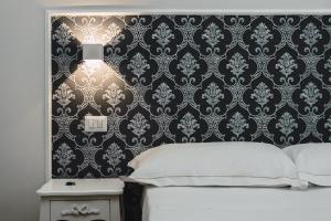 Posteľ alebo postele v izbe v ubytovaní Elysium B&B