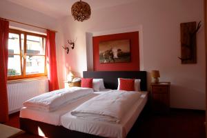 Ένα ή περισσότερα κρεβάτια σε δωμάτιο στο Hotel Gamshof