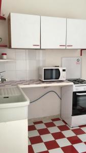 A kitchen or kitchenette at Al Baglio low cost