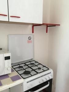 A kitchen or kitchenette at Al Baglio low cost