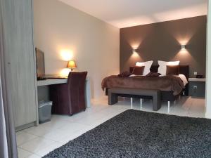 Postel nebo postele na pokoji v ubytování B&B Maison Kerkhove