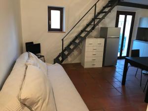 Ένα ή περισσότερα κρεβάτια σε δωμάτιο στο Al Borgo Antico
